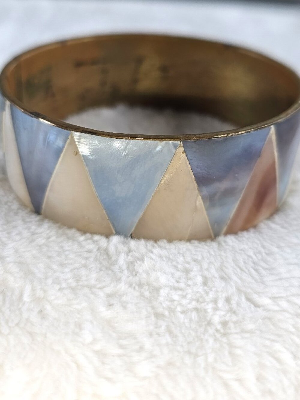 vintage brass bangle bracelet with mother-of-pearl inlay in sawtooth pattern